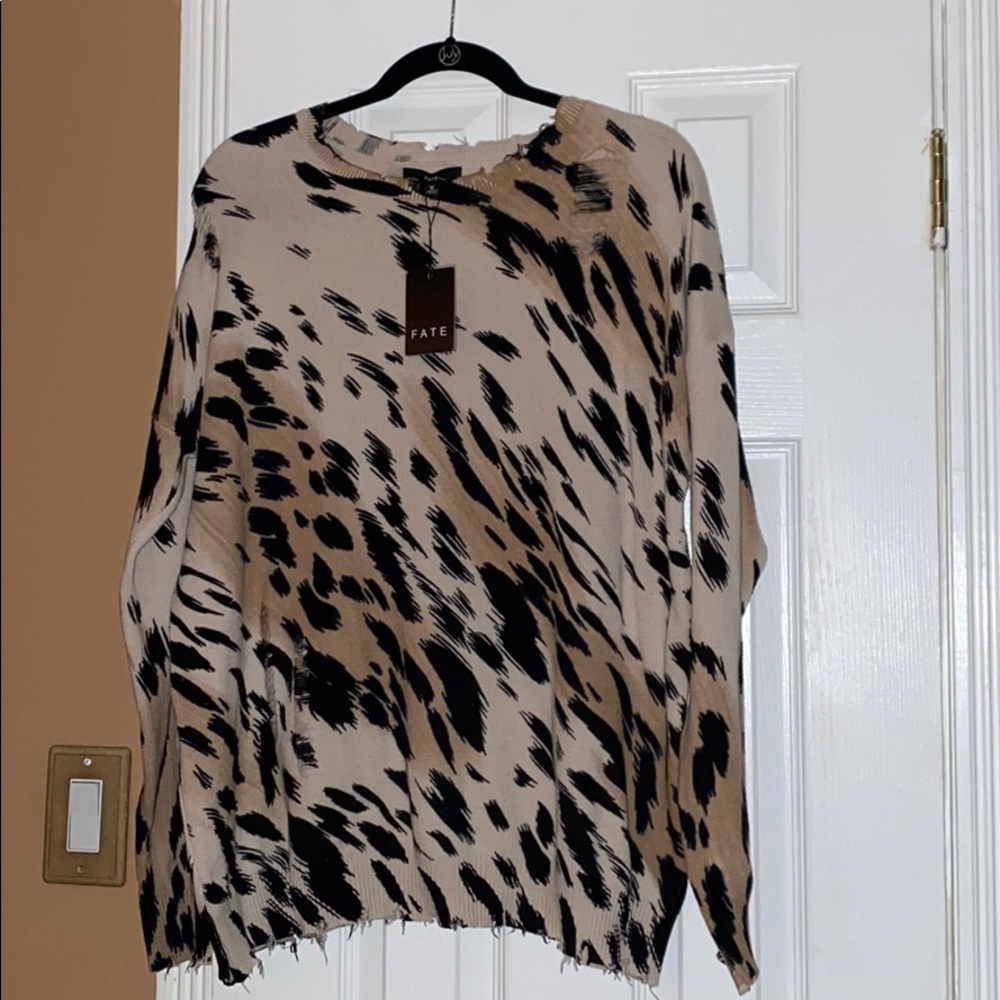 Animal print destroyed top